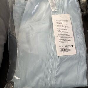 Light Blue Zip-Up Jacket and leggings